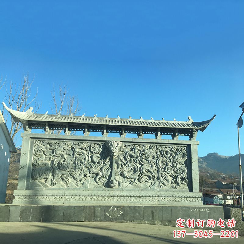 苏州青石九龙壁，精美雕塑饰衬城市广场