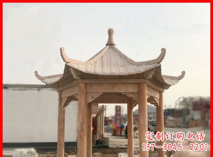 苏州晚霞红公园六角石雕凉亭