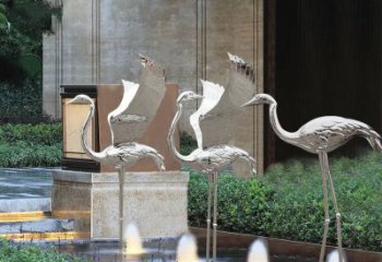 苏州鹤雕塑-公园不锈钢镜面喷泉中的鹤雕塑